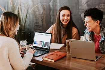 Students studying and laughing