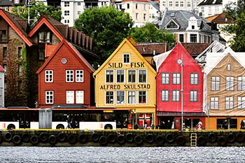 Photo of Norwegian town by water | Image by fernweh folks from Pixabay