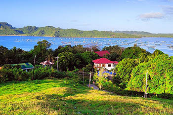 Photo of Phillipines beach and houses | Image by Arleen Mistica from Pixabay