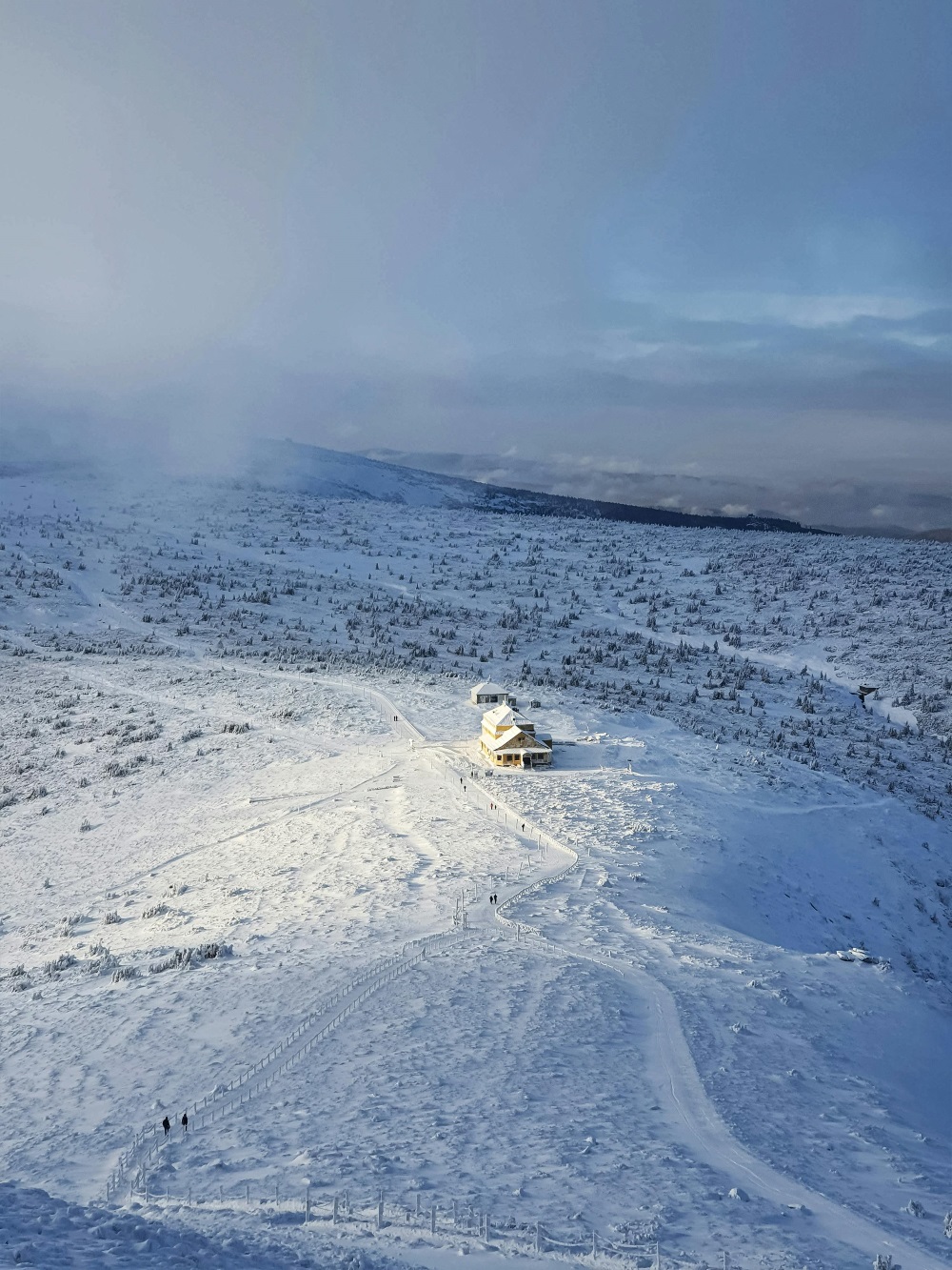 Landscape of snowy mountainside with house. Karpacz, Hradec Králové Region, Poland., 