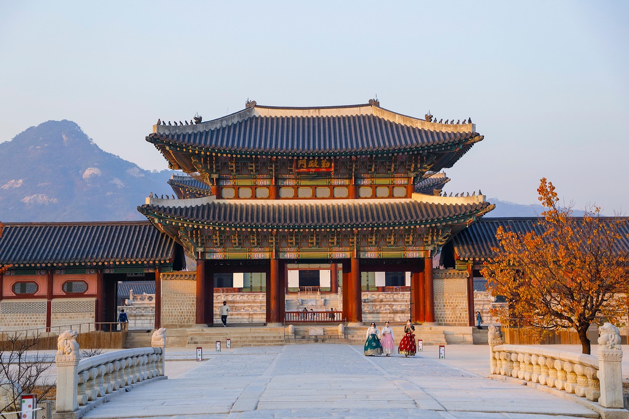 Gyeongbok palace with tourists walking, 