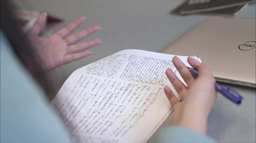 video thumbnail some hands with a book