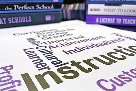 Photo of text and books about learning and teaching
